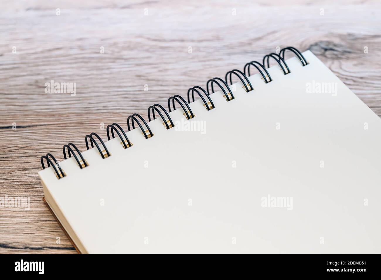 Blank notebook isolated on a wood background with copy space Stock ...