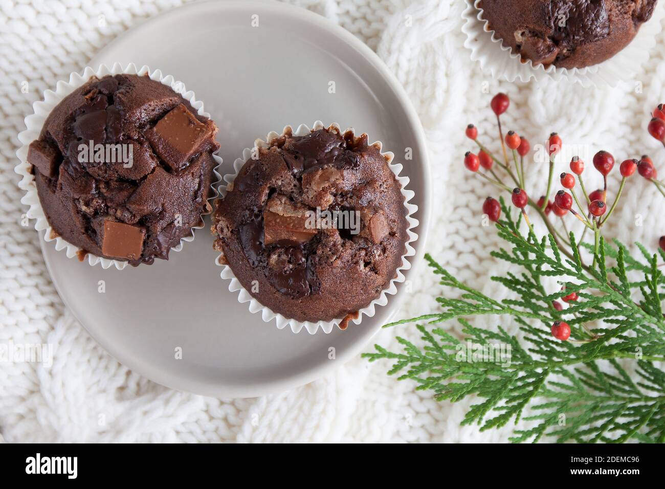 Chocolate muffins with decoration on the plate Stock Photo - Alamy
