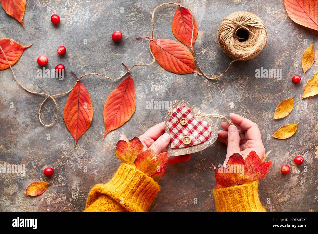 Fall DIY decorations from natural materials. Making floral garland with