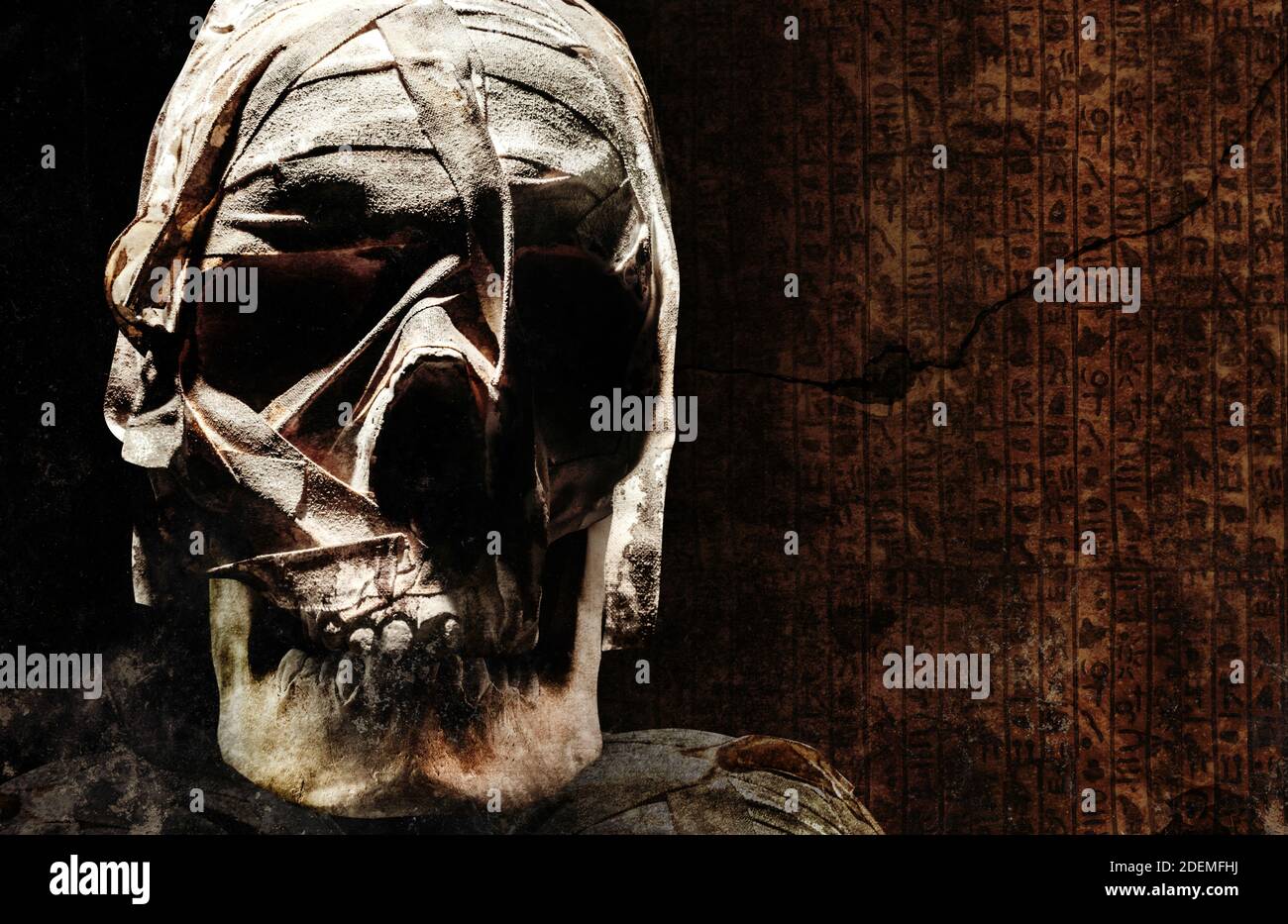 Photo of an old andcient egyptian mummyfied human skull with bondages on dark crypt background. Stock Photo