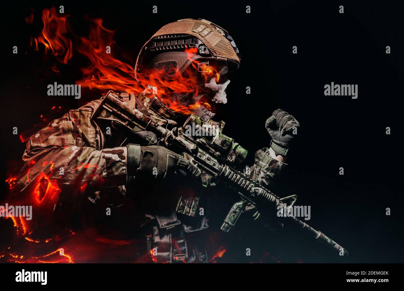 Photo of a fully equipped military burning skeleton soldier in armor vest with rifle attacking on black background Stock Photo
