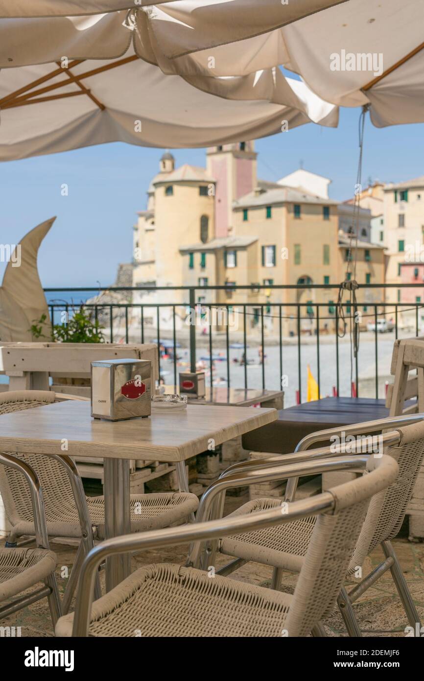 Waiting for a cafe on the seaside of Camogli, Italy Stock Photo