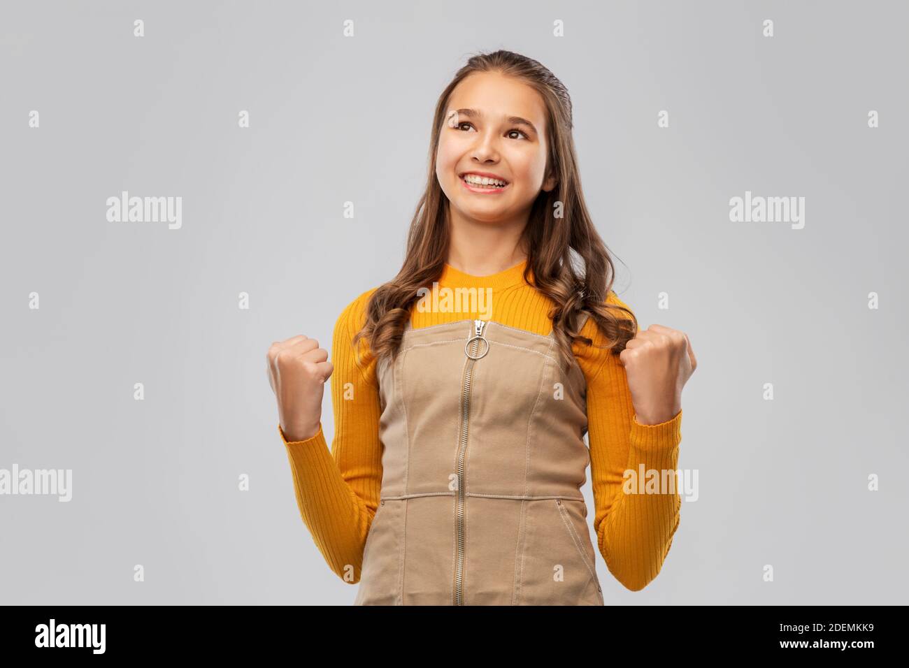 happy young teenage girl celebrating success Stock Photo - Alamy