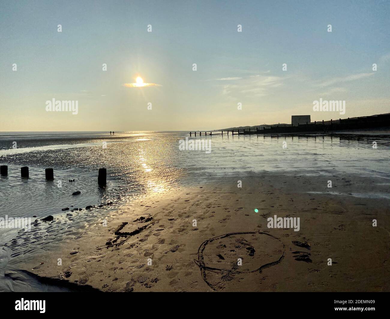 Winchelsea beach landscape view at low tide exposing flat sand with