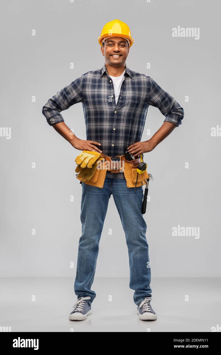 happy indian worker or builder with crossed arms Stock Photo