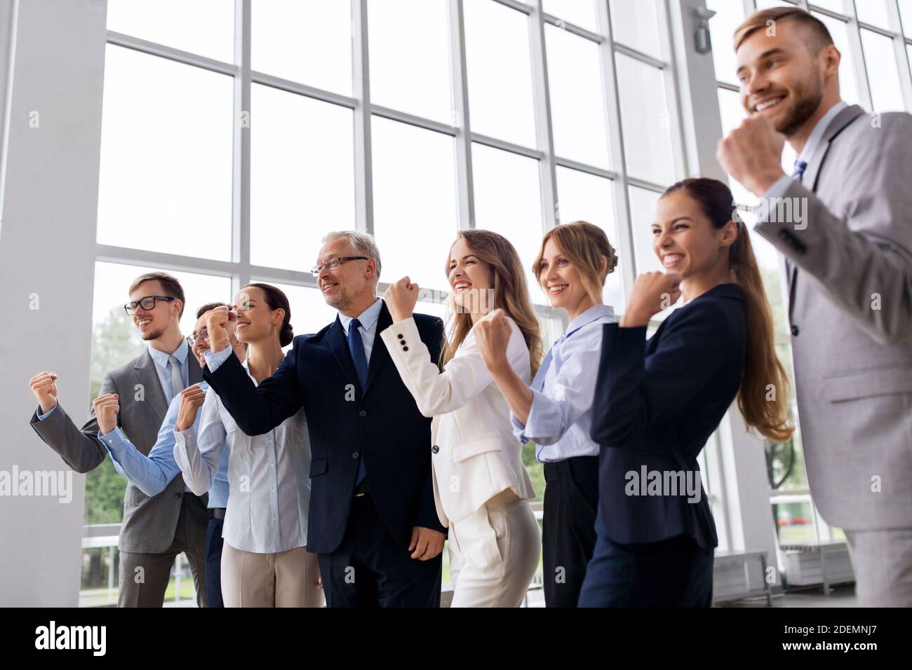 happy business team celebrating success at office Stock Photo