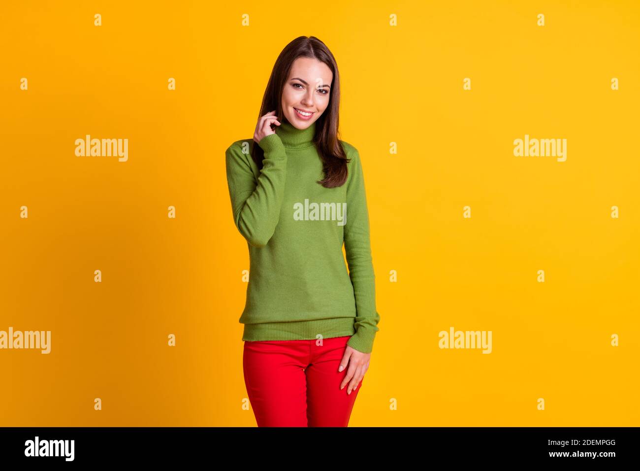 Portrait Of Attractive Slender Cheerful Shy Girl Wearing Casual Clothing Isolated Over Bright