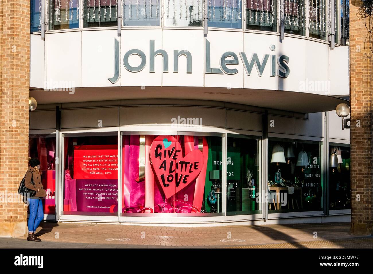 London UK, December 01 2020, People Standing Outside A Large John Lewis Department Store Stock Photo