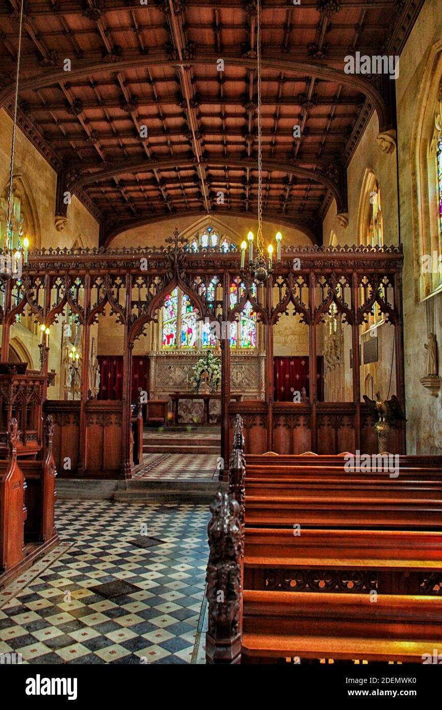 The unusual carved wooden lattice and knave of the Tudor St Mary's church on  the grounds of medieval  Sudeley Castle in the Cotswolds, Gloucestershir Stock Photo