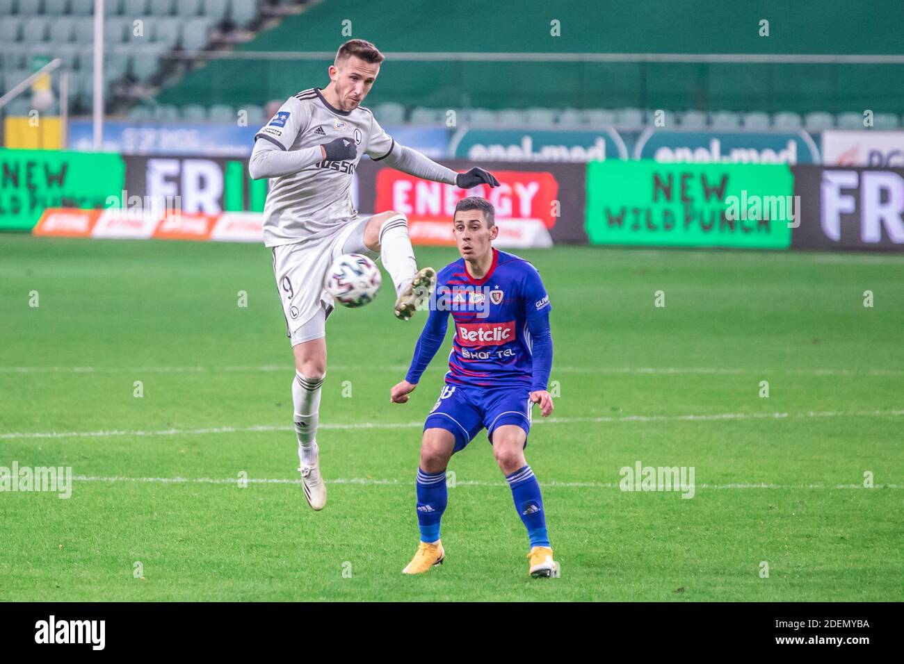Tomas Pekhart Of Legia And Patryk Sokolowski Of Piast Are Seen In Action During The Polish Pko Ekstraklasa League Match Between Legia Warszawa And Piast Gliwice At Marshal Jozef Pilsudski Legia Warsaw