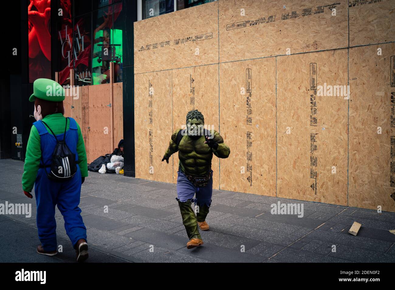 NEW YORK, UNITED STATES - Nov 03, 2020: A performer dressed as the Incredible Hulk charges at the camera in New York City's Times Square Stock Photo