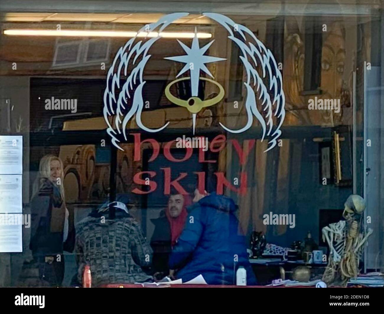 Bristol, UK. 26th November 2020. Bristol based tattoo studio, Holey Skin, has reopened less than 2 weeks after being fined for breaching government lo Stock Photo