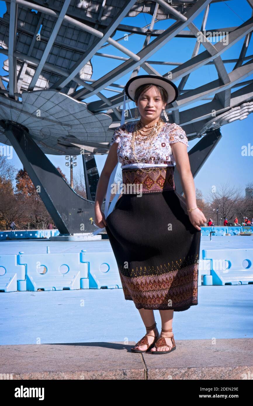 A young Ecuadorian dancer dances during the making of a video. At the Unisphere in Flushing Meadows, Corona Park in Queens, New York City. Stock Photo