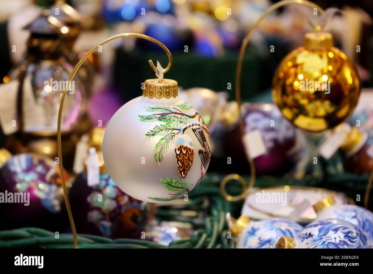 Toy balls in a Christmas shop, sale of festive decorations for New Year