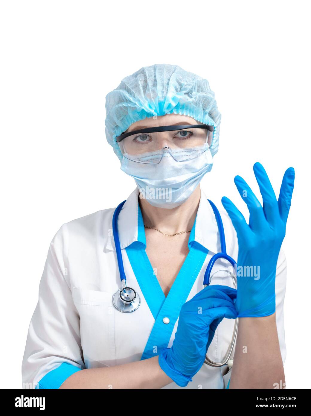nurse in a protective mask and goggles puts on blue rubber gloves, isolated background. Medicine and health. Fighting Coronavirus. Stock Photo