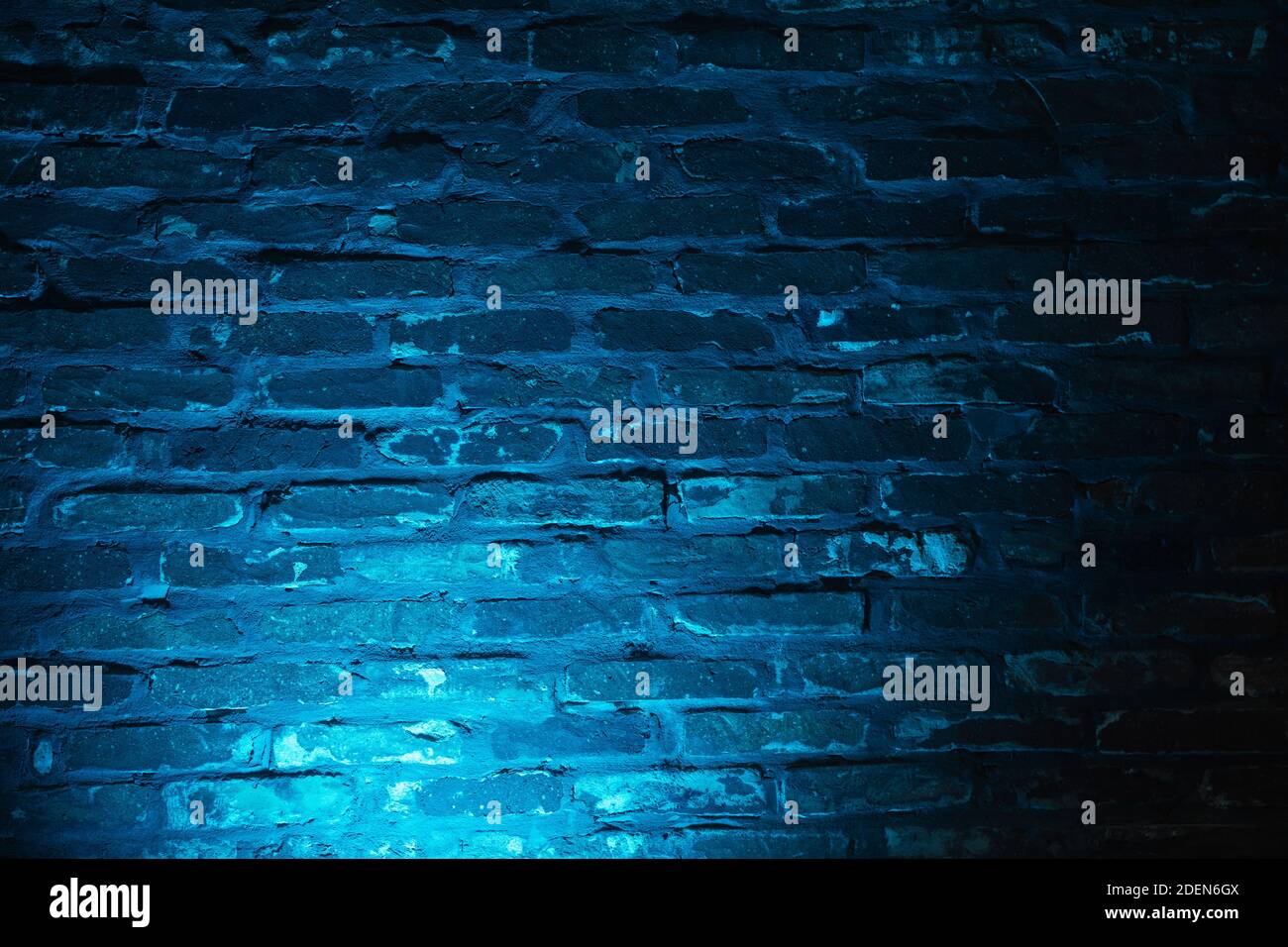 Brick wall texture with light blue neon effect as a background Stock ...
