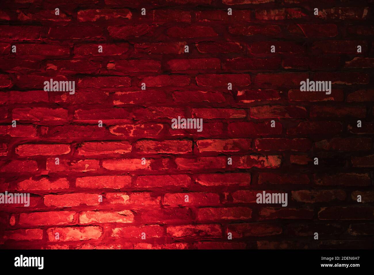 Background of empty brick wall with red neon light Stock Photo - Alamy