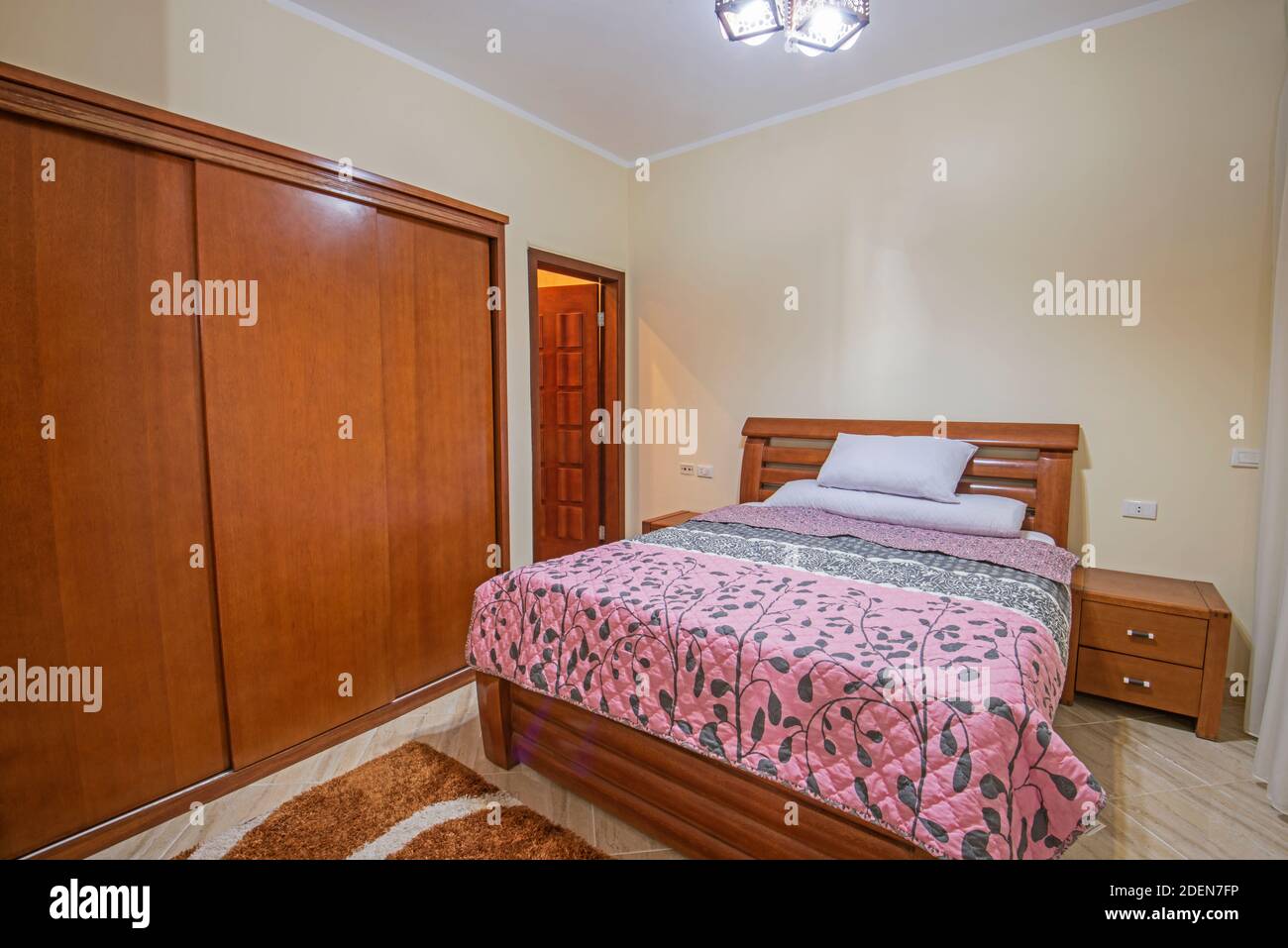 Interior design decor furnishing of luxury show home bedroom showing