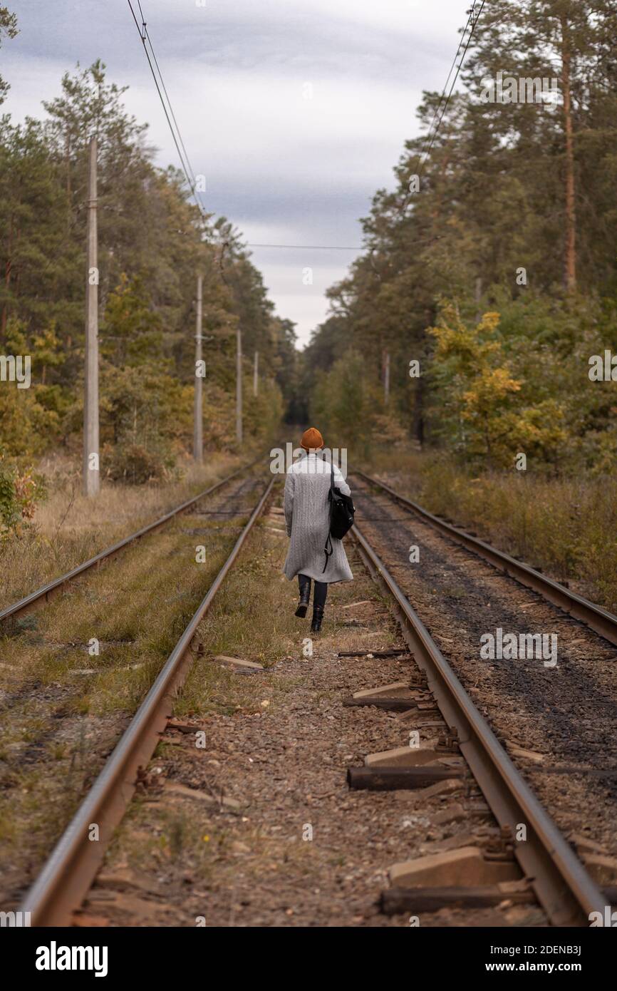 Girl walking alone in forest hi-res stock photography and images - Alamy