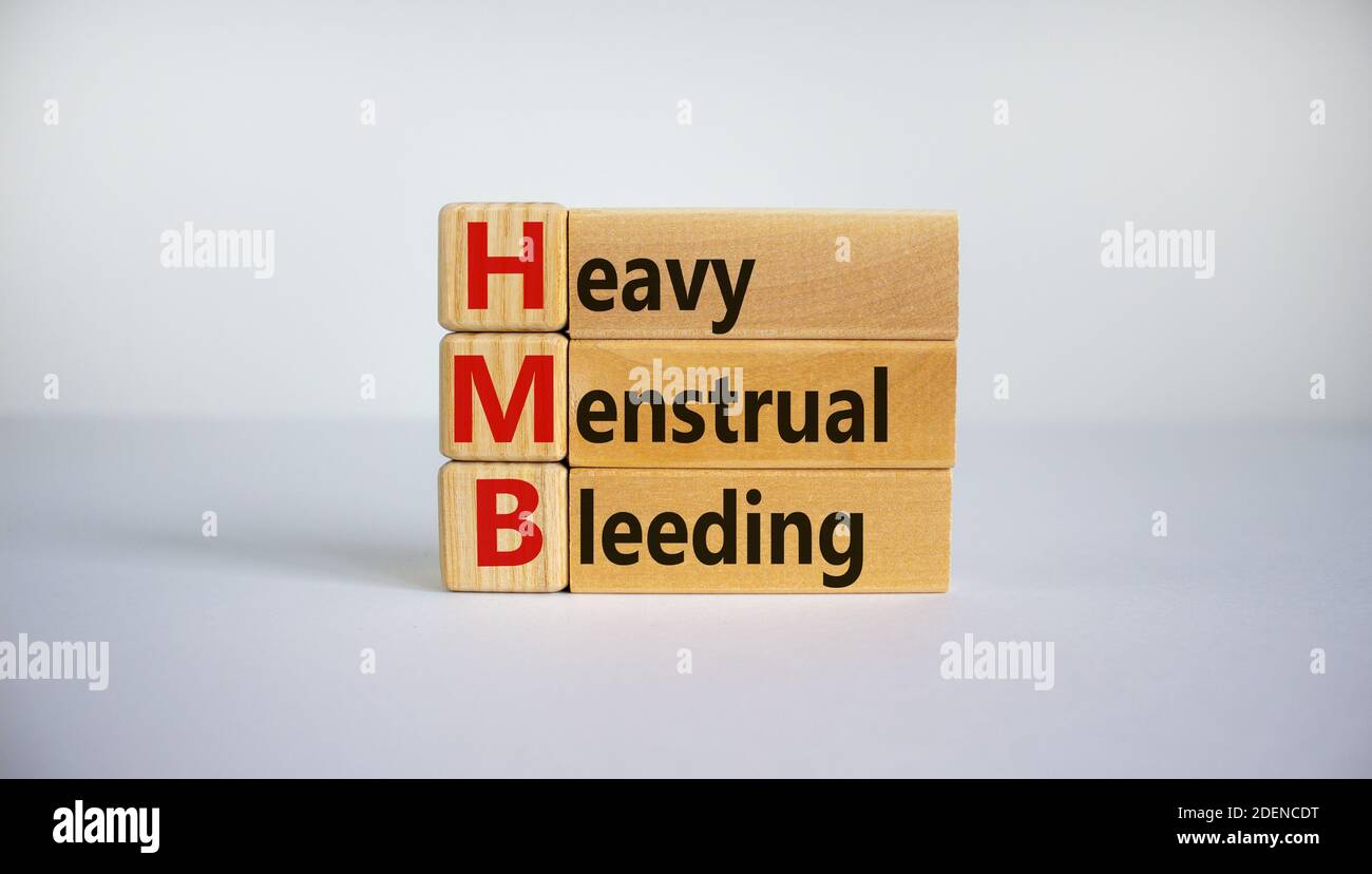 HMB symbol. Wooden cubes and blocks with words 'HMB - heavy menstrual ...