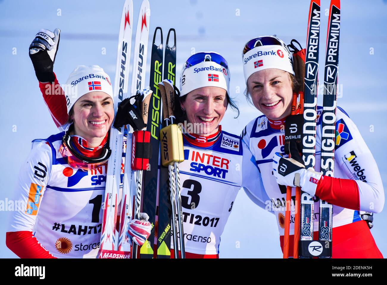 Norwegian Marit Bjørgen (center) after winning 30-K at the 2017 World Championships, Lahti, Finland.(L) Heidi Weng. (R) Astrid Uhrenholdt Jacobsen. Stock Photo