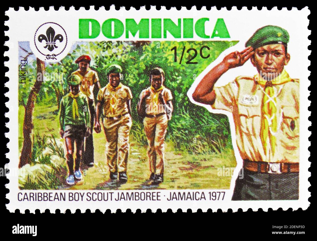 MOSCOW, RUSSIA JUNE 28, 2020 Postage stamp printed in Dominica shows Boy Scout on hike
