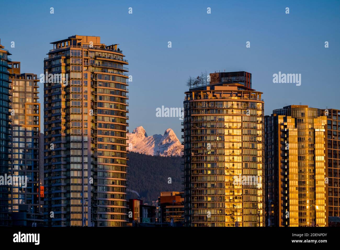 The North Shore, Lions mountain peaks from downtown Vancouver, British Columbia, Canada Stock Photo
