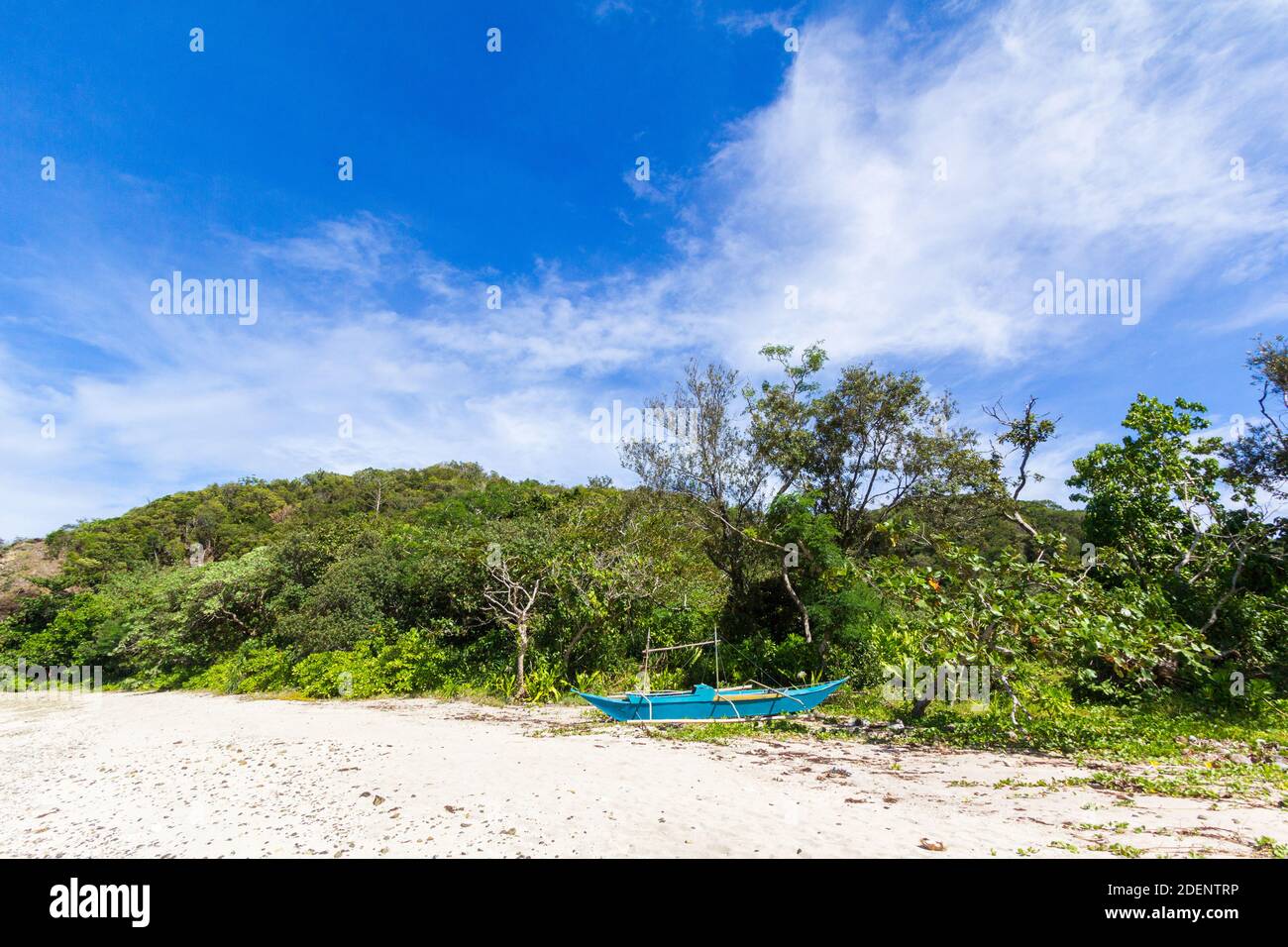 Outrigger boat at a beach in Baler, Philippines Stock Photo