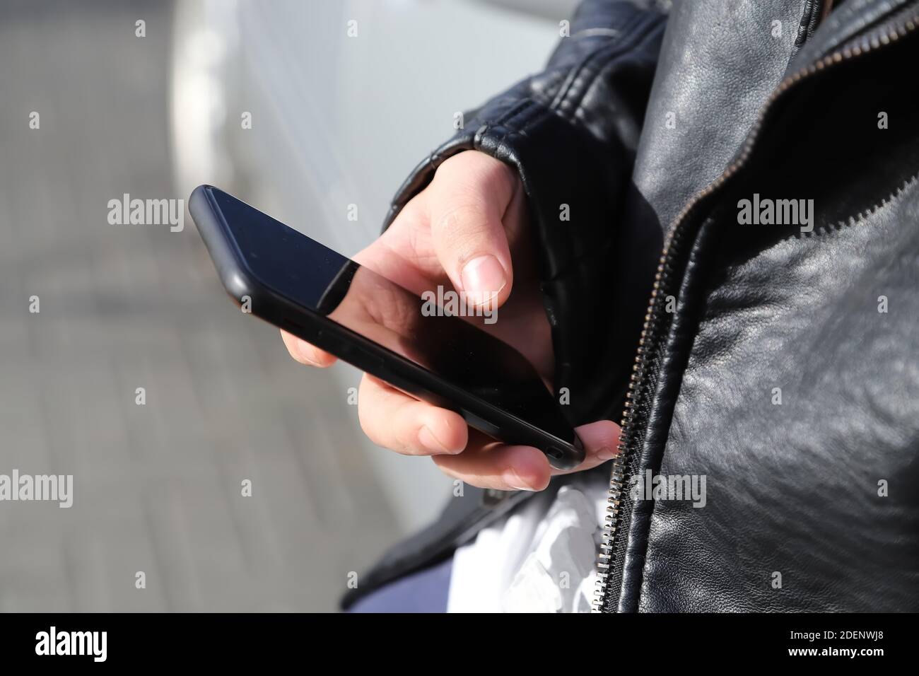 mobile device in a hand Stock Photo
