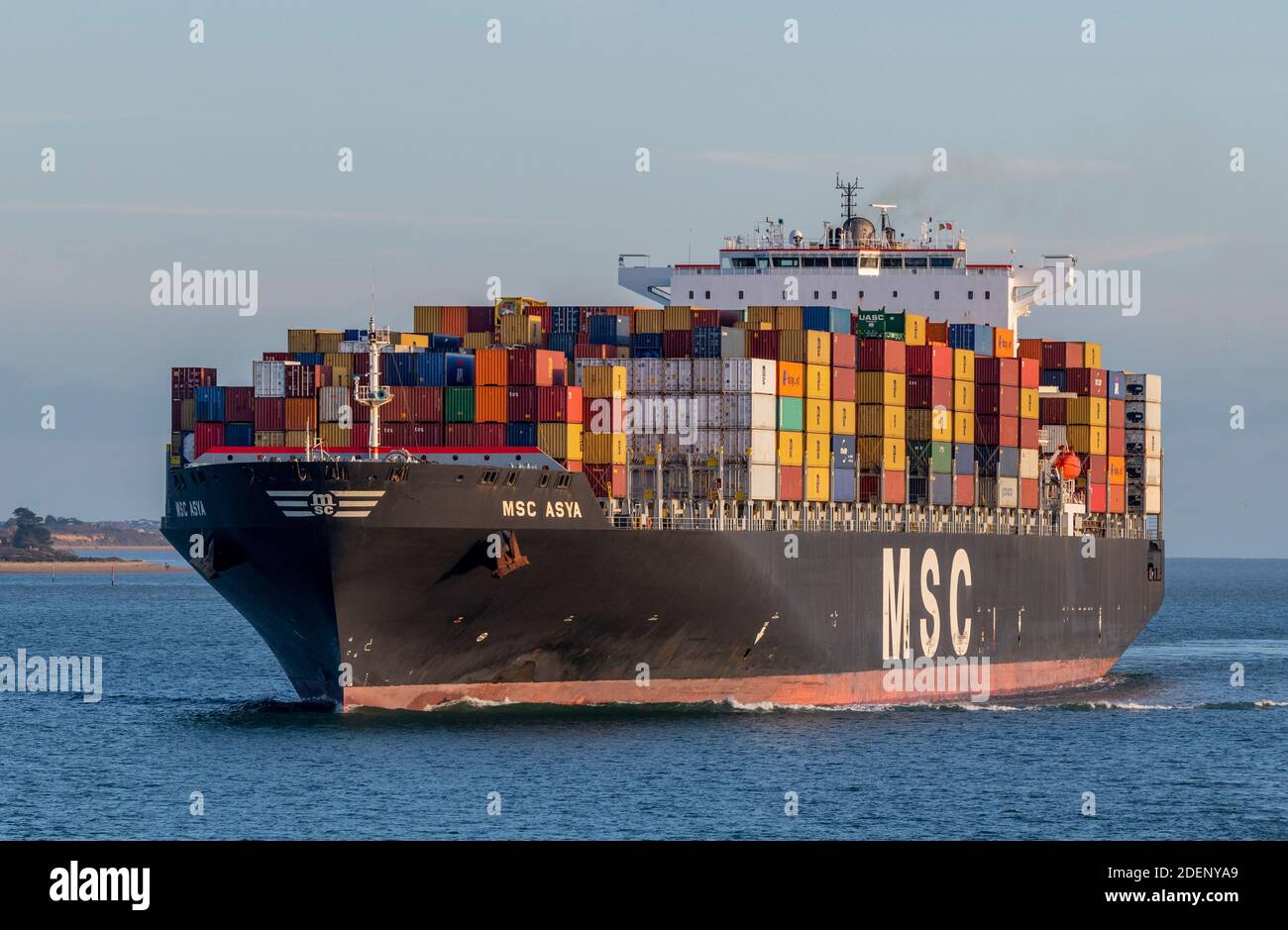 a large container ship the MSC Asya entering southampton water and the ...