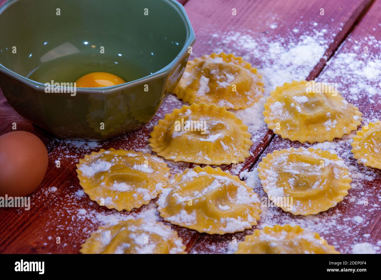 A still life with fresh homemade pasta with flour and egg Stock Photo ...