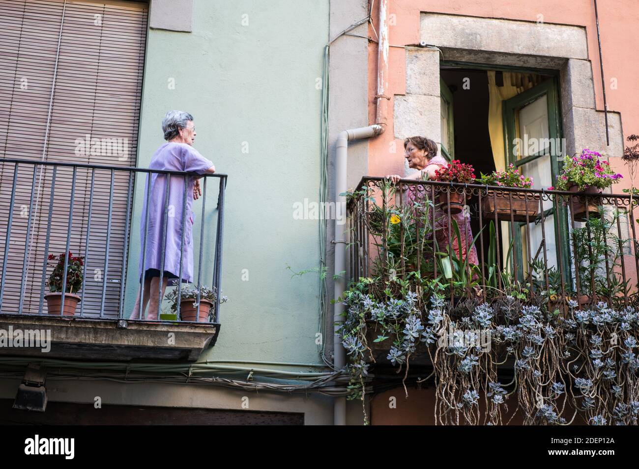 Local people on the balcony in the Girona, Catalonia, Spain, Europe. Stock Photo