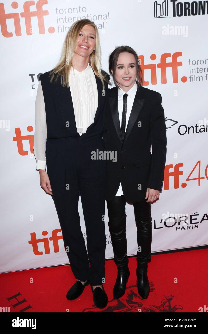 **File Photo** Ellen Page Comes Out as Trans changes Name To Elliot. Toronto, Canada - September 13: Samantha Thomas and Ellen Page attend the 'Freeheld' premiere at the 2015 Toronto International Film Festival on September 13, 2015 in Toronto, Canada. Credit: Diego Corredor/MediaPunch Stock Photo