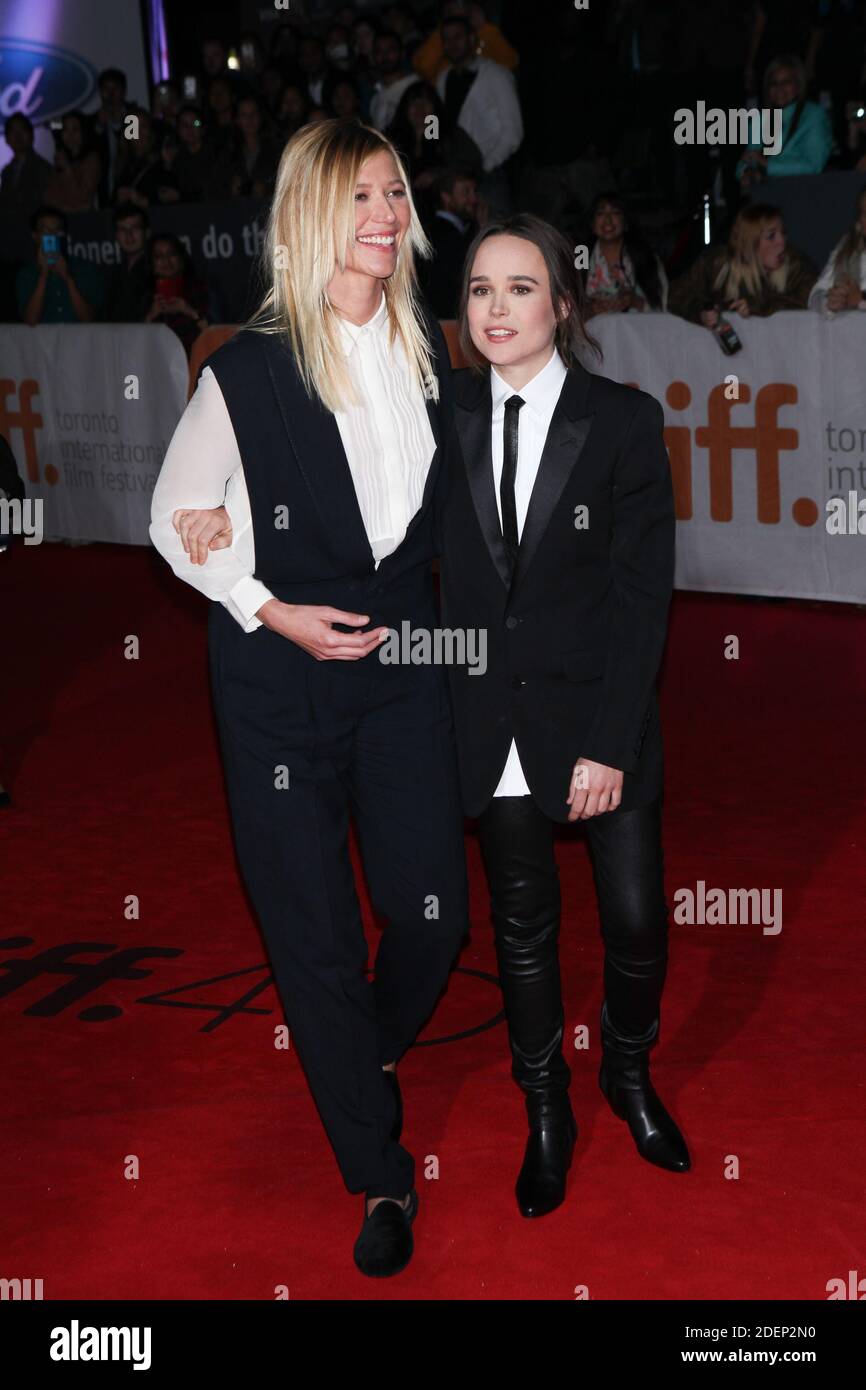 **File Photo** Ellen Page Comes Out as Trans changes Name To Elliot. Toronto, Canada - September 13: Samantha Thomas and Ellen Page attend the 'Freeheld' premiere at the 2015 Toronto International Film Festival on September 13, 2015 in Toronto, Canada. Credit: Diego Corredor/MediaPunch Stock Photo