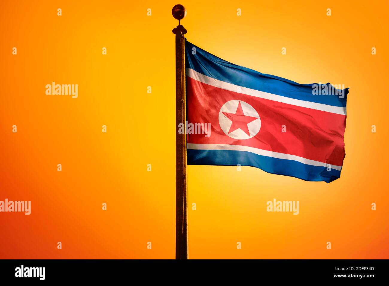 North Korea Flag, Flag waving with Sunrise Stock Photo