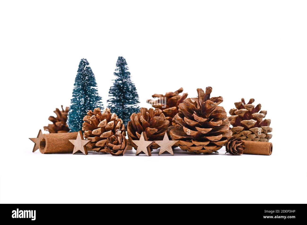 Christmas arrangement with seasonal pine cones, small Christmas trees