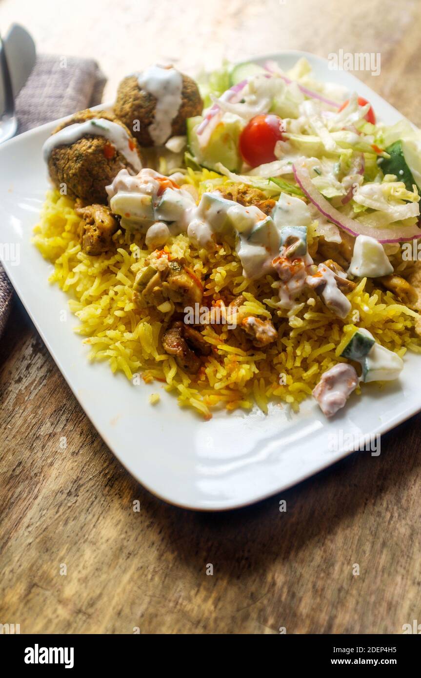 NYC street style Halal chicken and yellow rice with falafel and pita ...