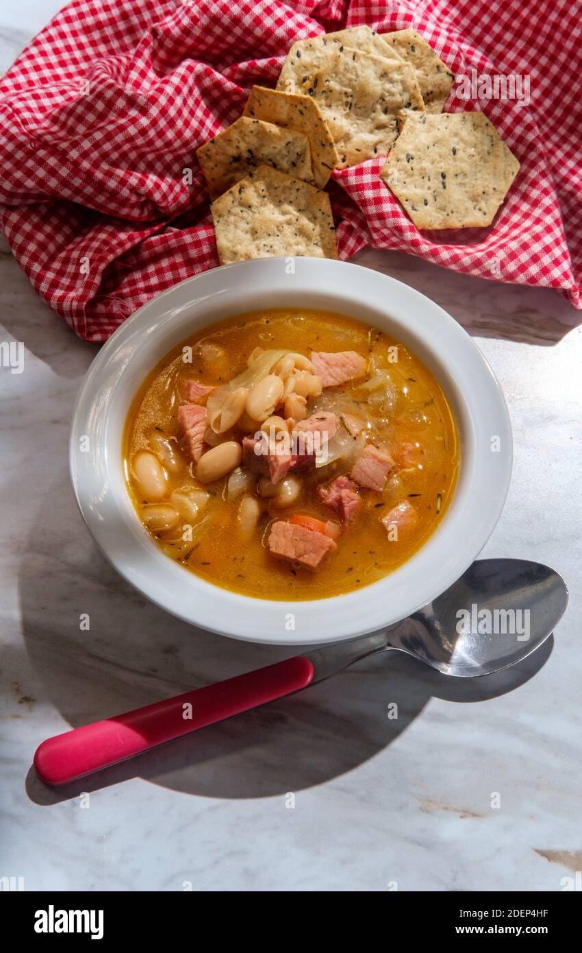 Simple slowcooker ham and cannellini bean soup with multigrain hexagon