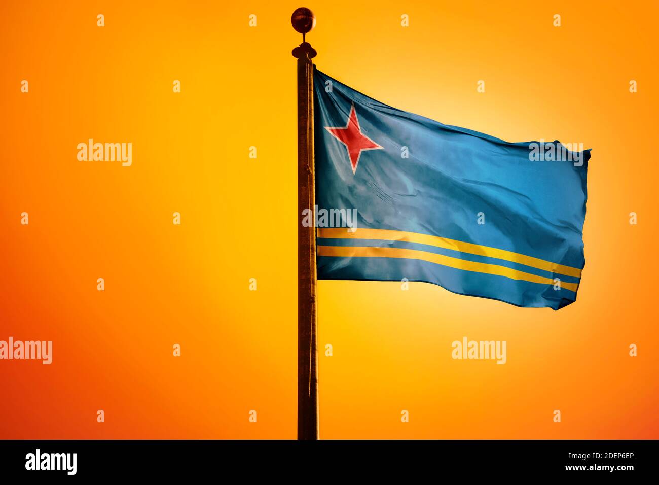 Aruba Flag, Flag waving with Sunrise Stock Photo