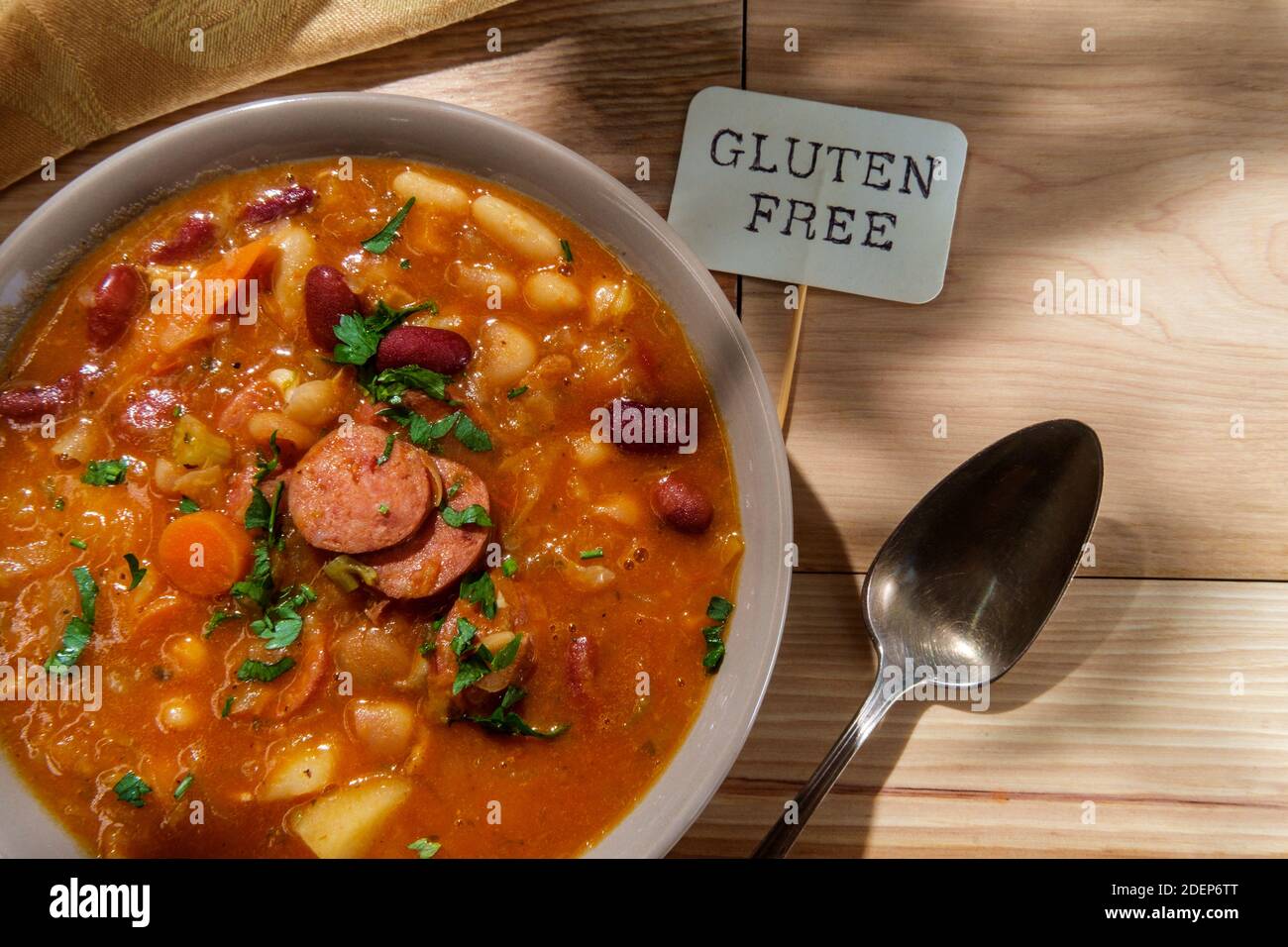 Traditional Polish sauerkraut kielbasa sausage and bean soup Stock