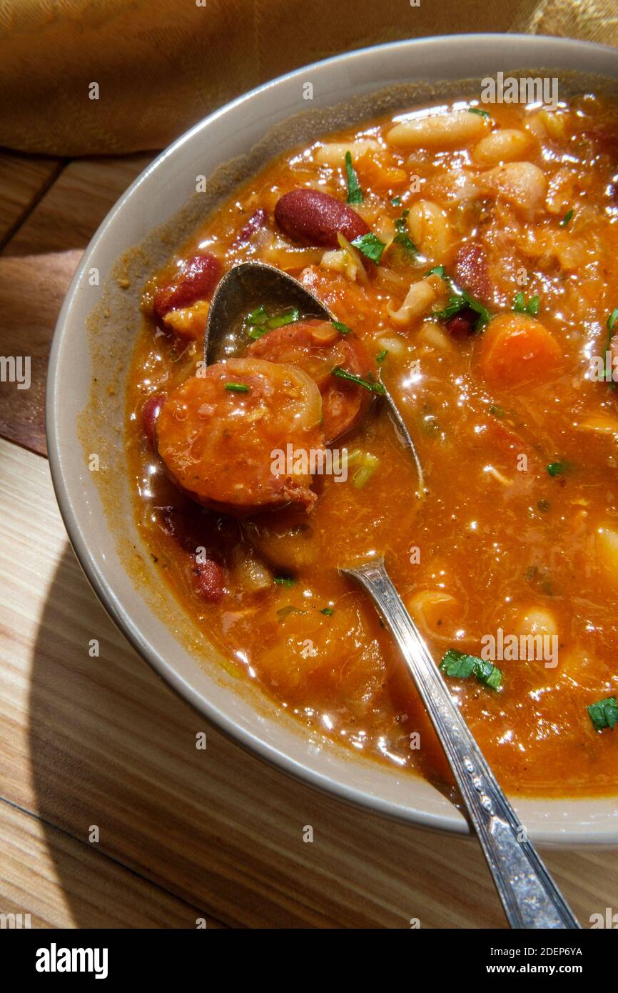 Traditional Polish sauerkraut kielbasa sausage and bean soup Stock