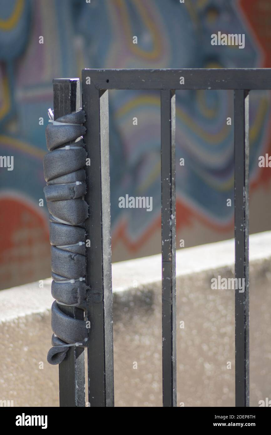 Solution for a squeaking gate DIY repair, using a foam wrap roll Stock