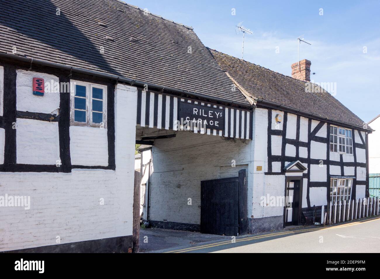 Riley's garage Nantwich Cheshire situated in black and white half timbered  building Stock Photo
