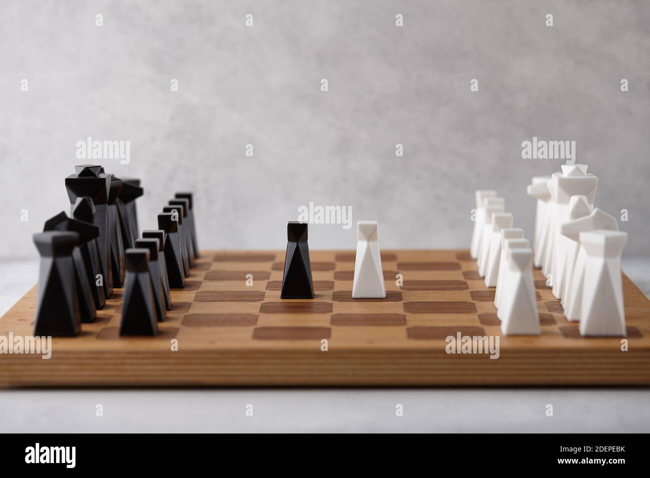 Chess board with white and black pieces. Intellectual competition. Stock Photo