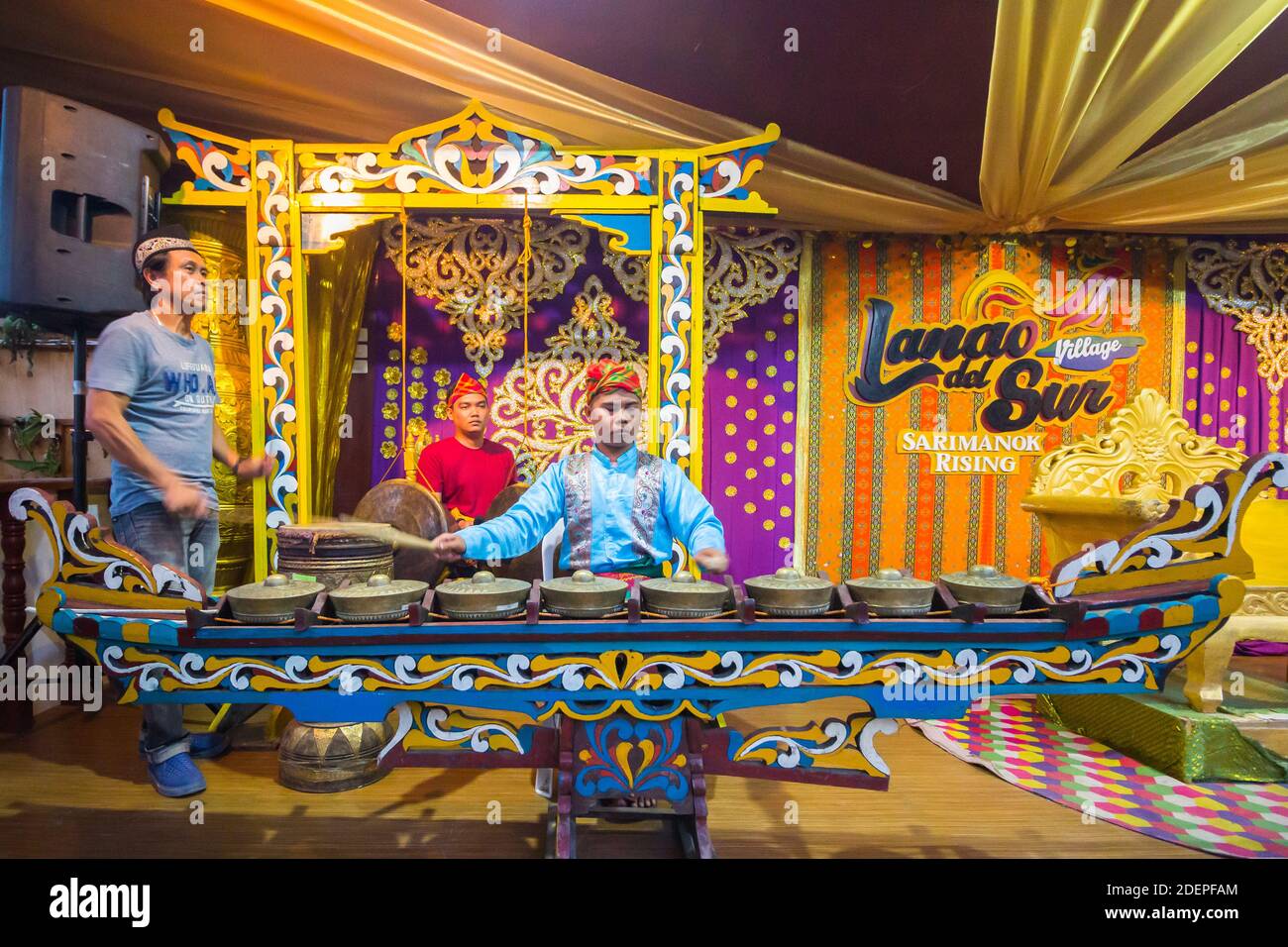 A kulintang ensemble with brass gongs are played at the Maranao Village at the Bangsamoro Government Center Stock Photo