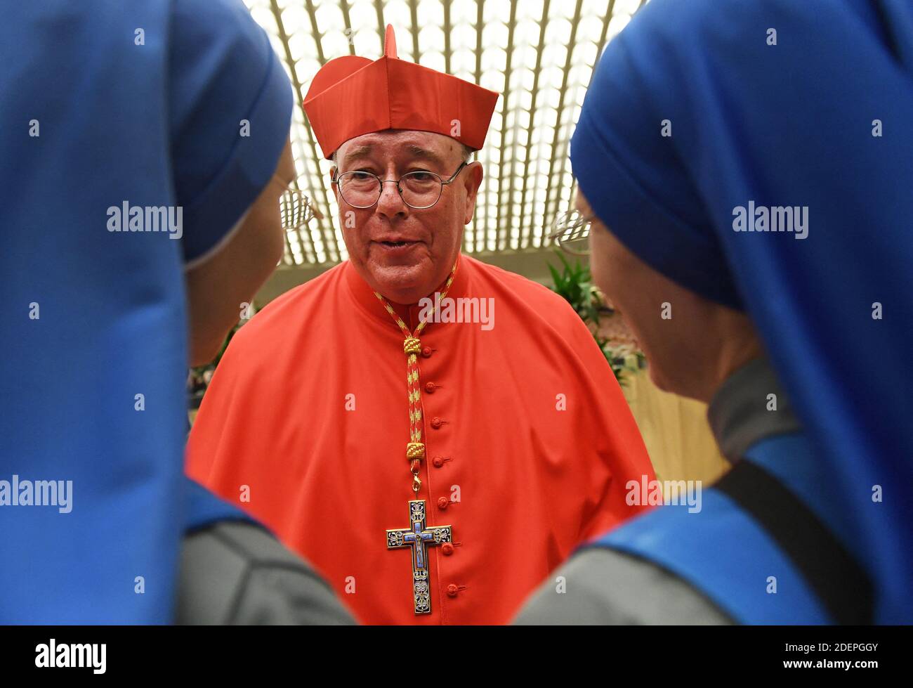 New cardinal Jean-Claude Hollerich (Luxembourg) poses as he meets with  relatives and friends during a courtesy visit following his appointment by  the Pope Francis, during a Consistory ceremony for the creation of