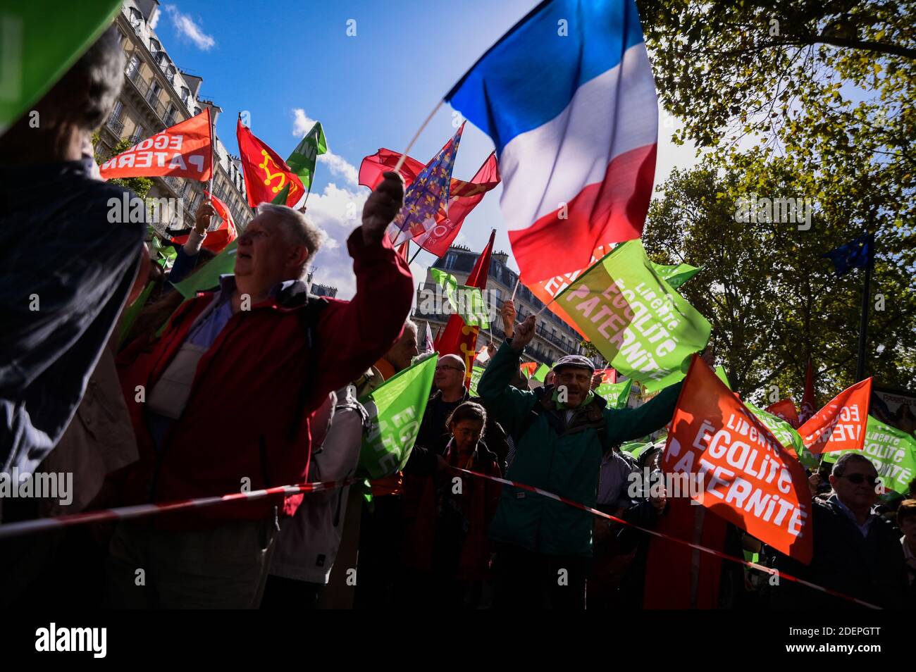 People hold flags as they take part in a Marchons Enfants demonstration against the GPA under the slogan Liberte Egalite Paternite where several tens of thousands of people people (between 75,000 and 600,000) responded to the call of the Manif Pour Tous movement to participate in Paris in the major mobilization entitled Marchons Enfants in order to protest against the Bioethics law legalizing PMA (medically assisted procreation) to homosexual couples. Paris, France, October 6, 2019. Photo by Julie Sebadelha/ABACAPRESS.COM Stock Photo