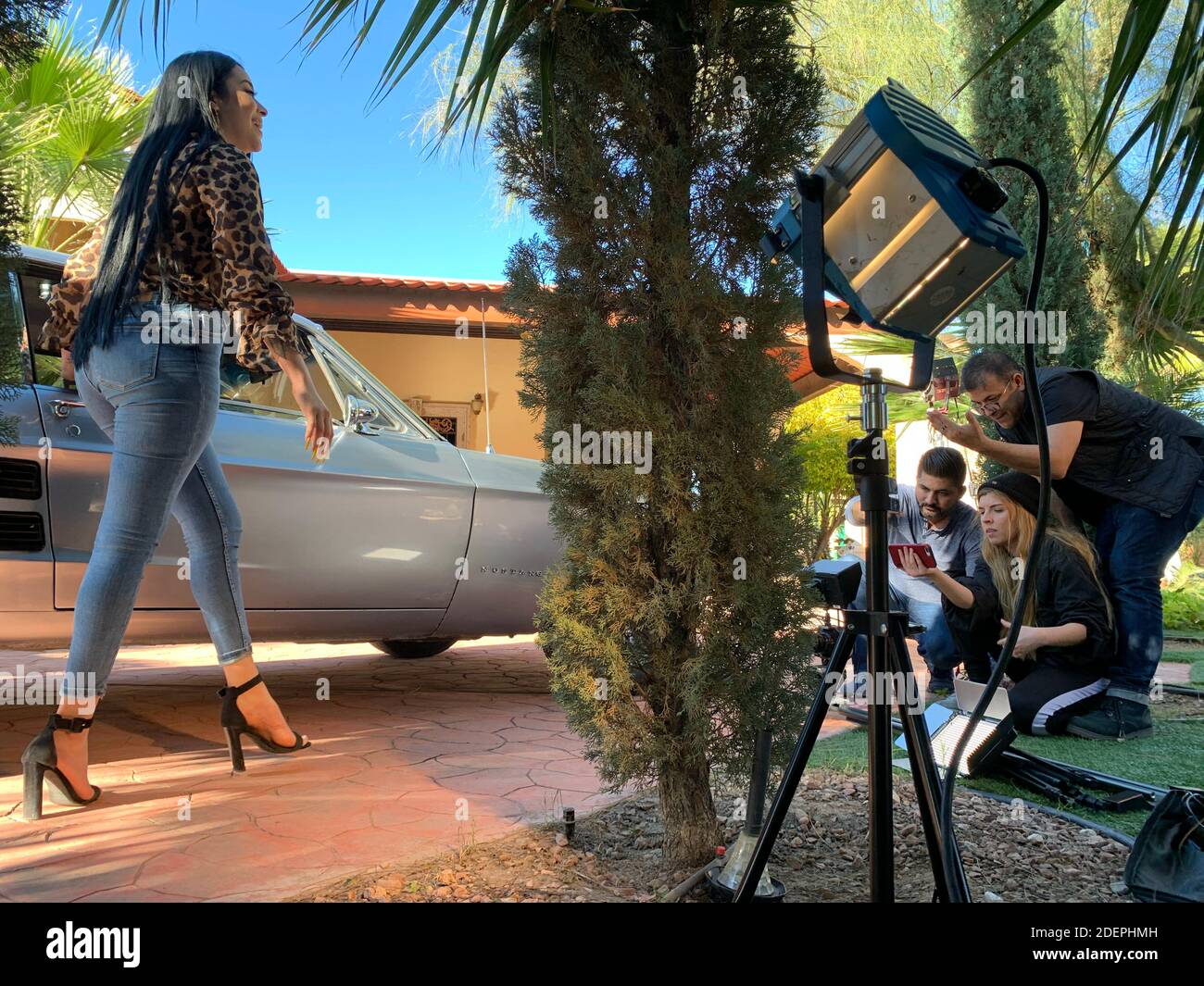 Sierreño Genre Example Musical production, recording of music video clip of a group from the ...