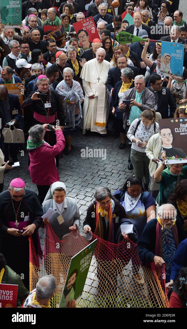 Pope Francis, catholic prelates and representatives of the Amazon Rainforest's ethnic groups march in procession during the opening of the Special Assembly of the Synod of Bishops for the Pan-Amazon Region on October 7, 2019 outside St. Peter's Basilica in the Vatican. Francis denounced past and present forms of colonialism and said some of the fires that devastated forests in Brazil in recent months were set by special interest groups. Photo by Eric Vandeville/ABACAPRESS.COM Stock Photo