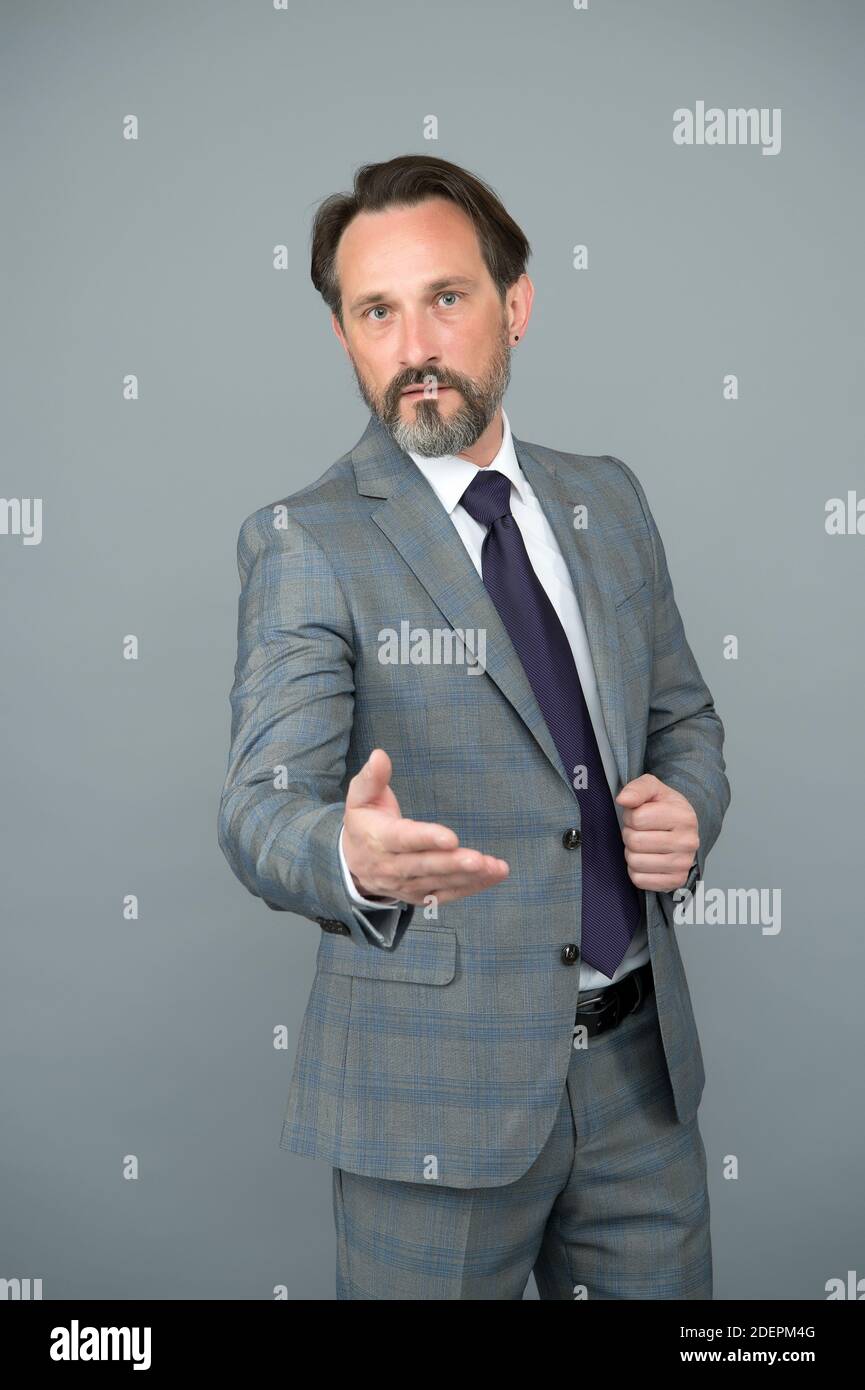 handsome adult boss man in office wear with tie going to shake hand business relations Stock Photo Alamy